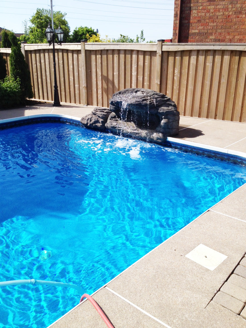 Photo of The Oasis - Complete Swimming Pool Waterfall Kit by Universal Rocks - Marquis Gardens