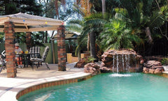 Photo of The Oasis - Complete Swimming Pool Waterfall Kit by Universal Rocks - Marquis Gardens