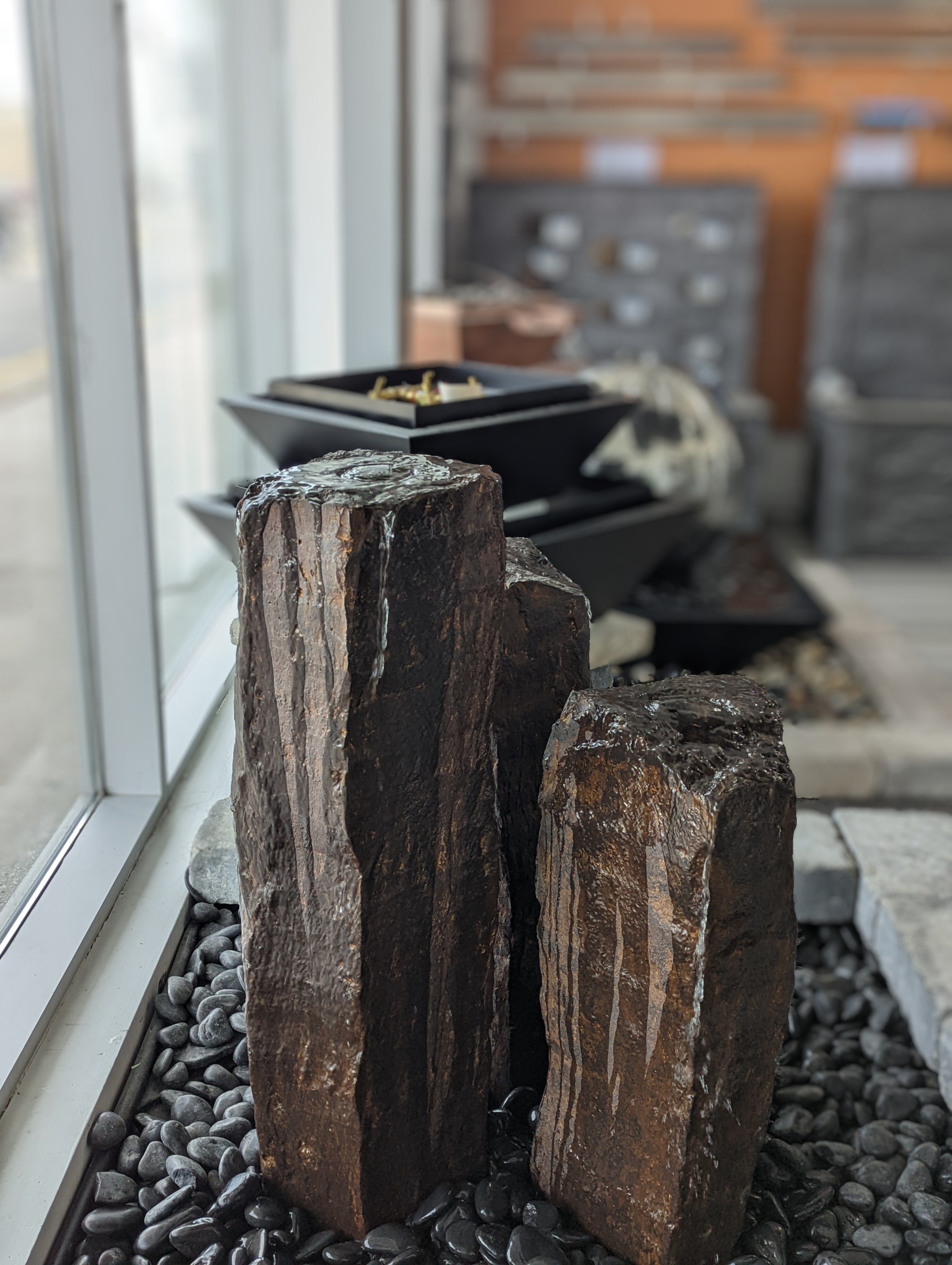 Photo of Cast Stone Mongolian Basalt Columns - Marquis Gardens