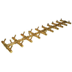 Photo of Tree-Style Linear Crossfire Brass Burners - Marquis Gardens