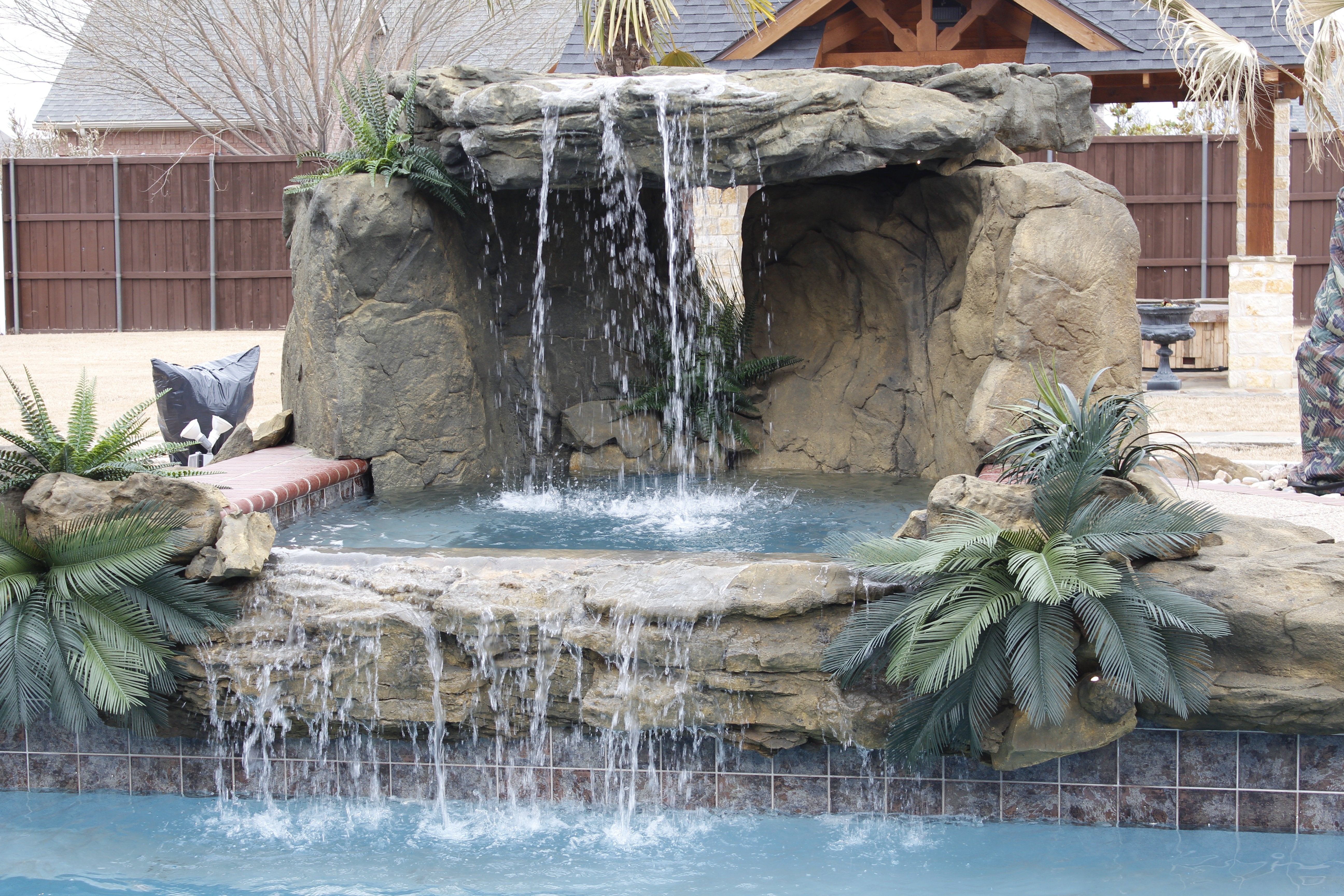 Photo of Universal Rocks Grotto Waterfall - Marquis Gardens